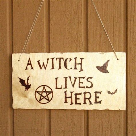 Beware a maleficent witch lives here sign